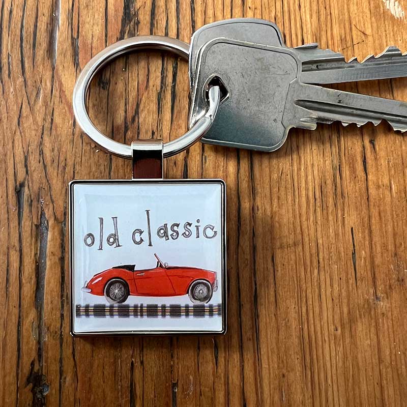 Alex Clark Keyring - Old Classic (red car)